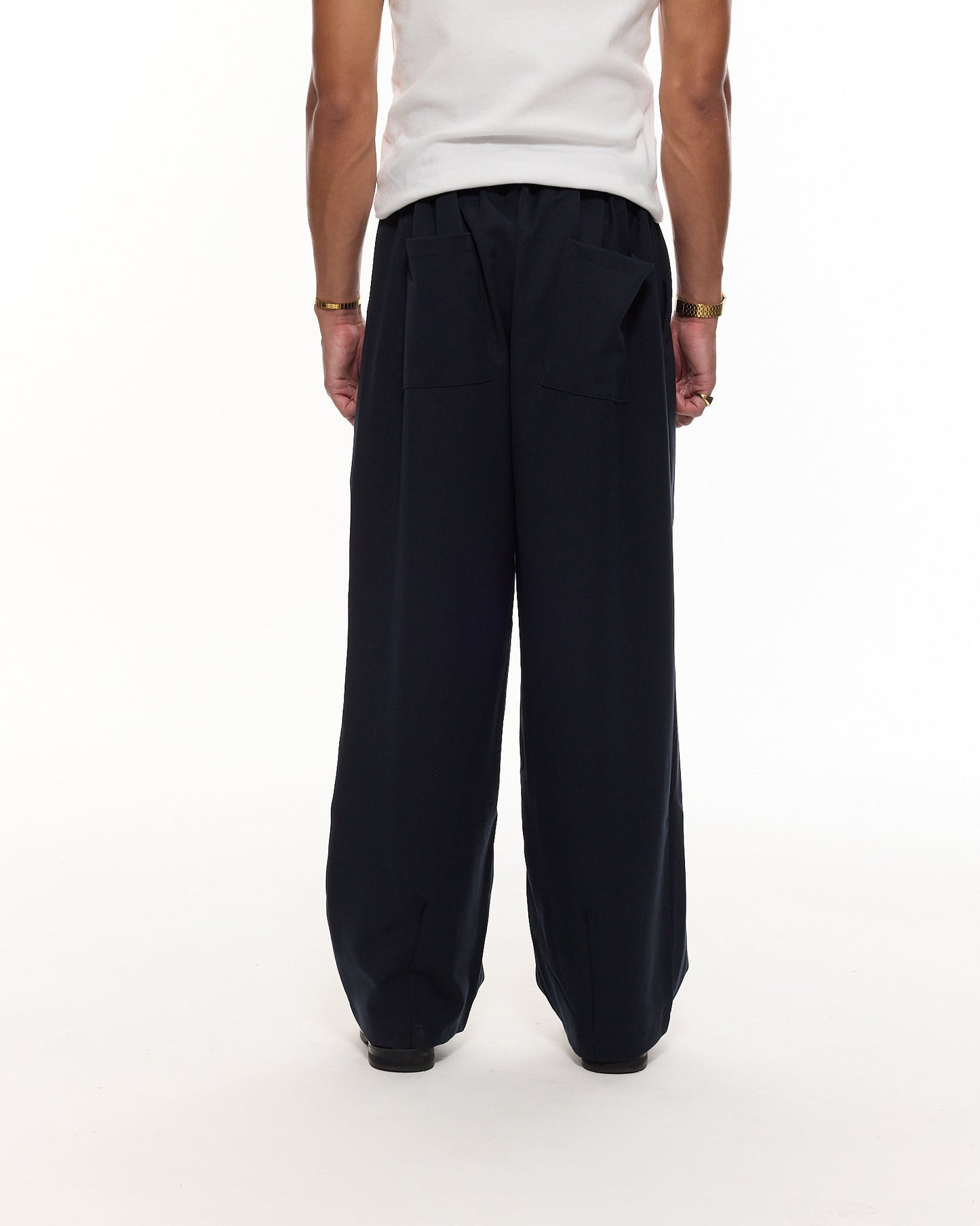 PLEATED PANTS – NAVY BLUE